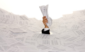 Hand with Captured Papers_&copy; Depositphotos.com_ginasanders_8315580