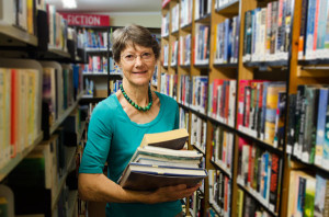 Librarian_holding_books