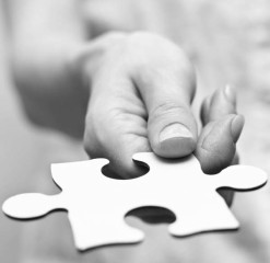 Hand_holding_puzzle_piece_Depositphotos.com_mitarart_9617281